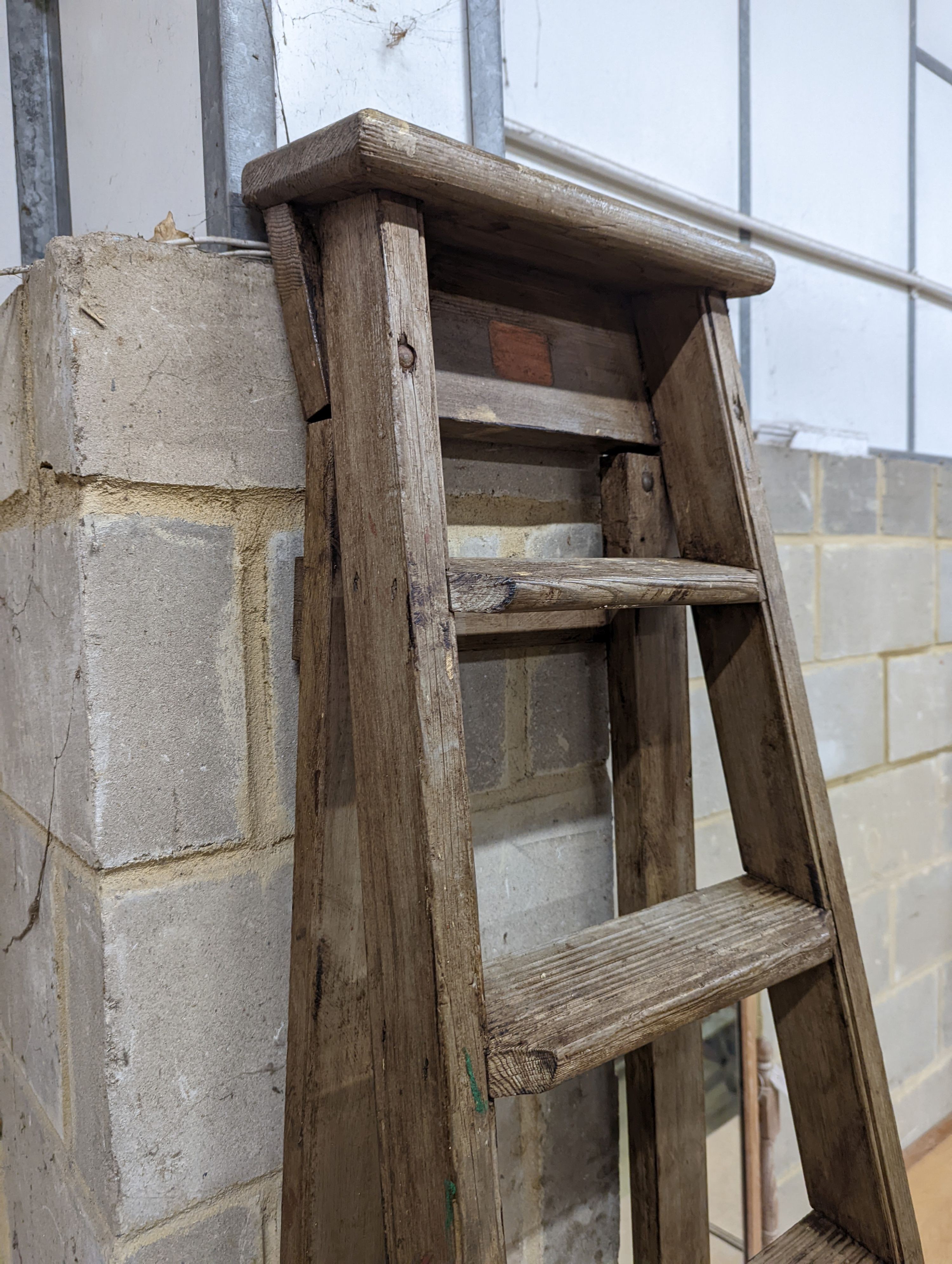 A vintage 8 tread wooden step ladder. H-224cm.